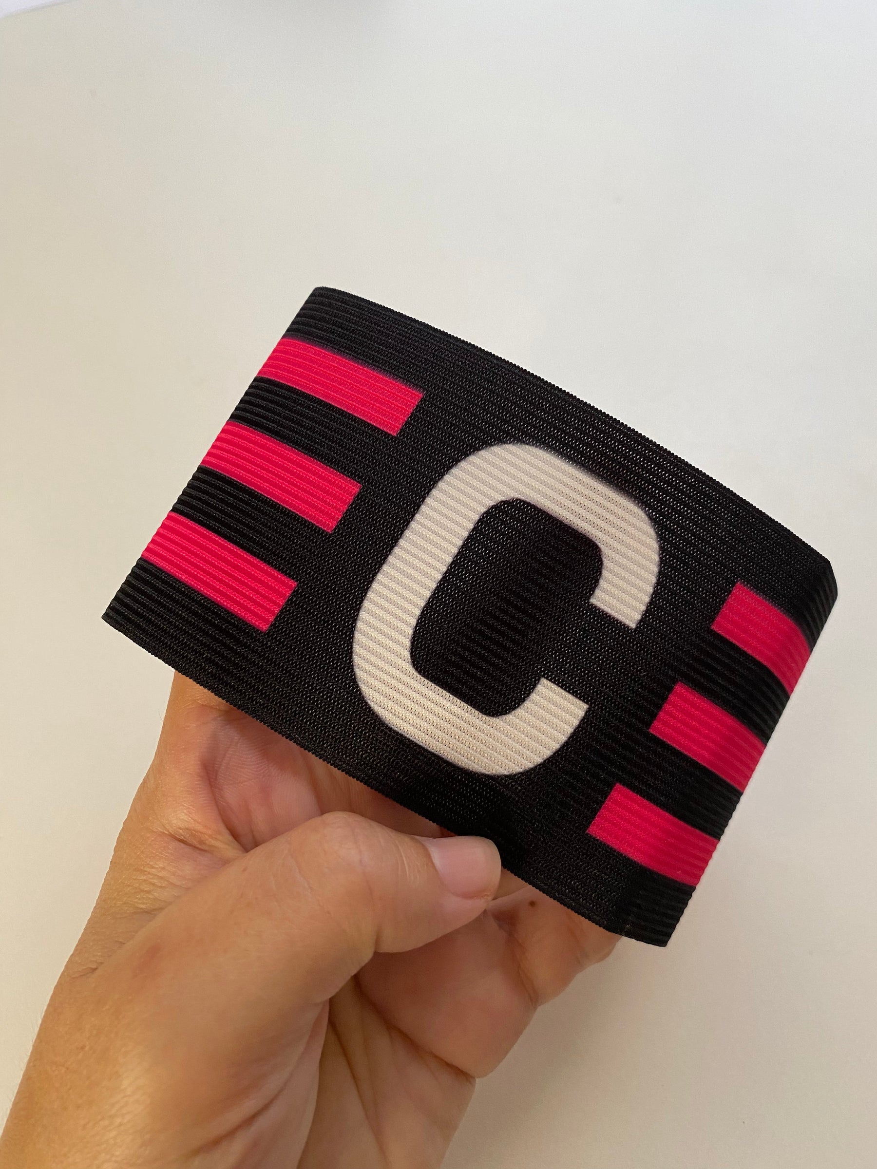 Faixa de Capitão Preto Rosa